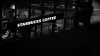 A Starbucks coffee shop exterior at night